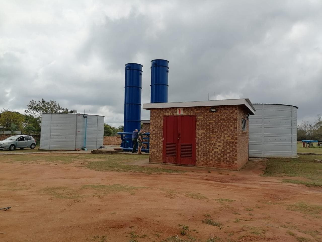 Compact Clean Water Treatment plant with treatment towers, storage reservoirs and pump house